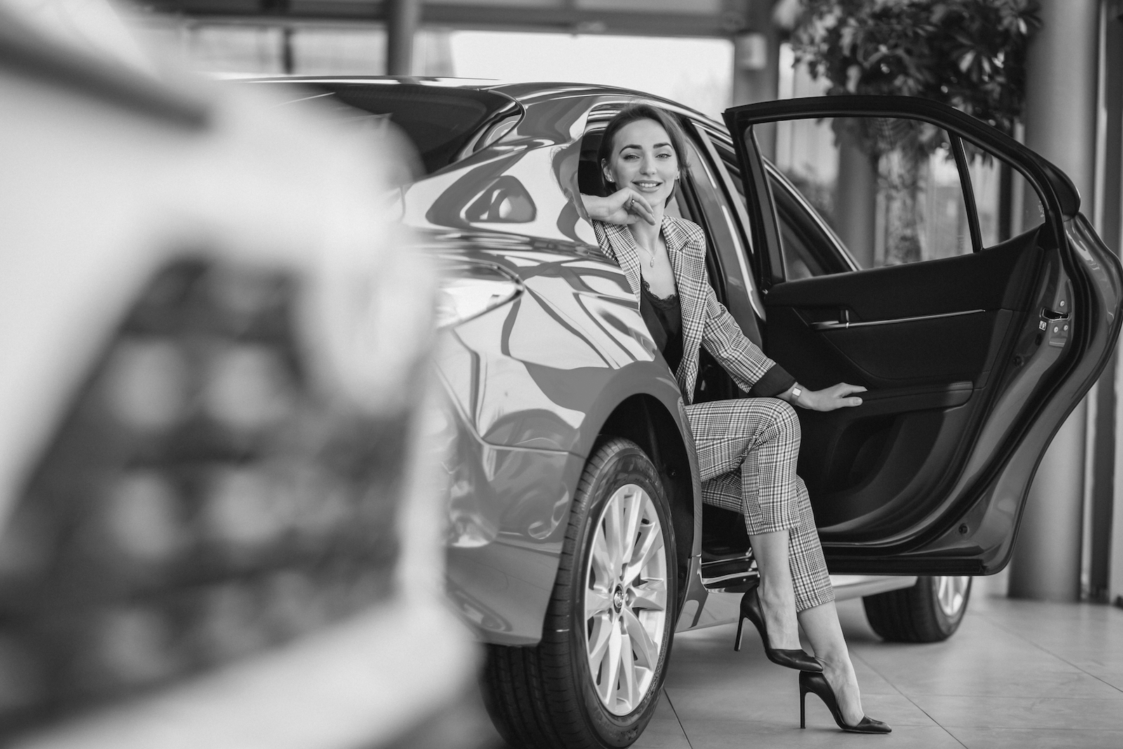 Business Women Sitting in Car